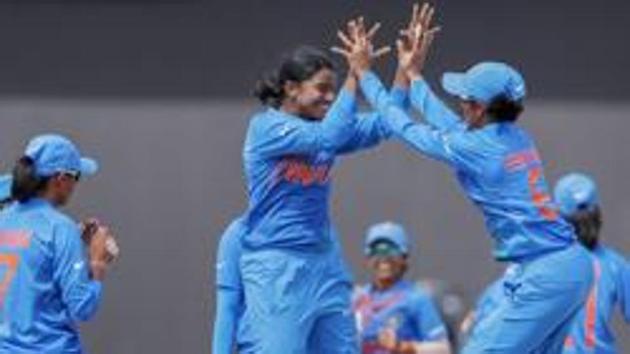 File image of players of Indian cricket team celebrating the fall of a wicket.(PTI)