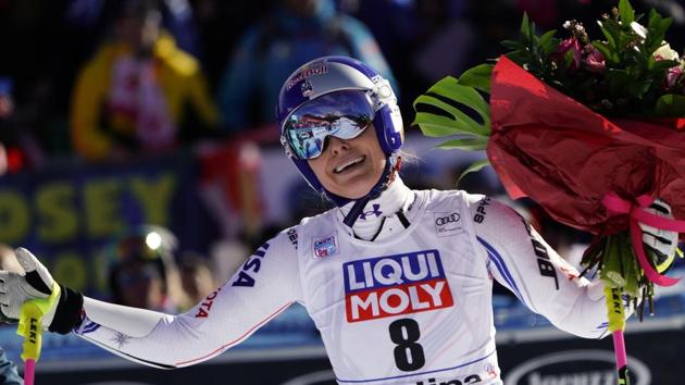 United States' Lindsey Vonn holds a bunch of flowers after completing an alpine ski, women's World Cup super-G in Cortina D'Ampezzo. (AP) United States' Lindsey Vonn holds a bunch of flowers after completing an alpine ski, women's World Cup super-G in Cortina D'Ampezzo. (AP)