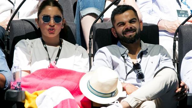 Virat Kohli and Anushka Sharma attending day six of the Australian Open.(AFP)