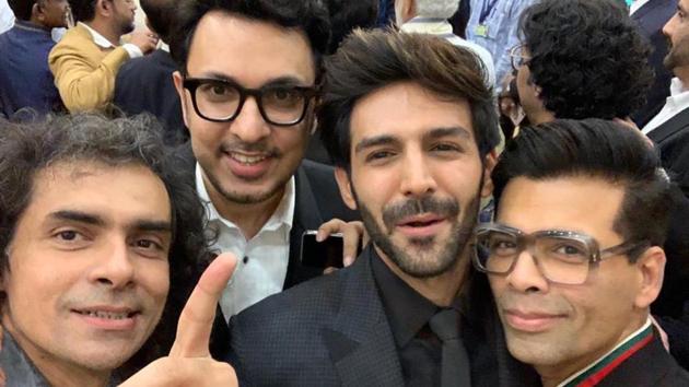 Imtiaz Ali poses with Dinesh Vijan, Kartik Aaryan and Karan Johar at the inauguration event. Imtiaz Ali poses with Dinesh Vijan, Kartik Aaryan and Karan Johar at the inauguration event.