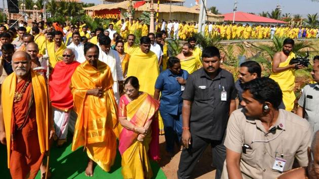 Amid chanting of Vedic hymns by hundreds of pandits, KCR and his wife Shobha began the Maha Rudra Sahita Sahasra Chandi Yagyam by breaking a coconut and pumpkin in front of the massive yagyashala, the place where the ritual is conducted.(HT Photo) Amid chanting of Vedic hymns by hundreds of pandits, KCR and his wife Shobha began the Maha Rudra Sahita Sahasra Chandi Yagyam by breaking a coconut and pumpkin in front of the massive yagyashala, the place where the ritual is conducted.(HT Photo)
