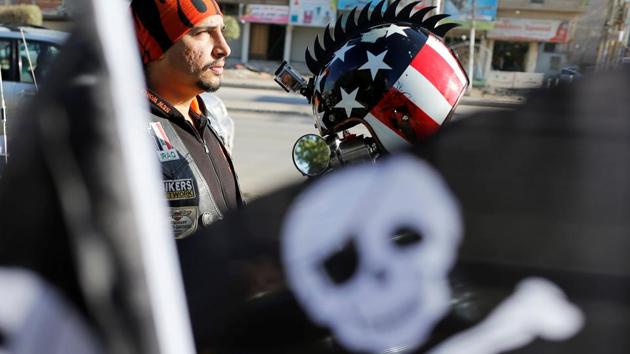 But while their style is unmistakably US-inspired - at least one of Bayati’s cohorts wears a helmet emblazoned with the stars and stripes - these bikers fly the Iraqi flag from the panniers of their machines. “It is a miniature Iraq,” said member Ahmed Haidar, 36, who works with an international relief agency. (Thaier Al-Sudani / REUTERS) But while their style is unmistakably US-inspired - at least one of Bayati’s cohorts wears a helmet emblazoned with the stars and stripes - these bikers fly the Iraqi flag from the panniers of their machines. “It is a miniature Iraq,” said member Ahmed Haidar, 36, who works with an international relief agency. (Thaier Al-Sudani / REUTERS)