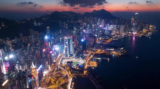 A general view of Hong Kong at night. The city’s dockyards are the fifth busiest in the world -- a far cry from the 1990s heyday -- but still a cornerstone of the economy and so popular with the Instagram generation that it is now possible to tour them. (Dale de la Rey / AFP) A general view of Hong Kong at night. The city’s dockyards are the fifth busiest in the world -- a far cry from the 1990s heyday -- but still a cornerstone of the economy and so popular with the Instagram generation that it is now possible to tour them. (Dale de la Rey / AFP)