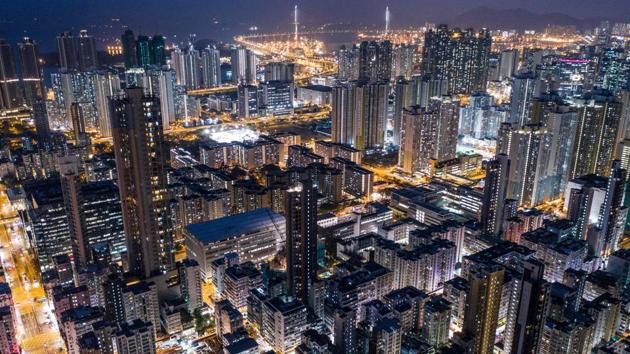 Commercial and residential buildings in Hong Kong at night. He added: “The city looks great at night and I spent a lot of time looking at Google Maps... so when I found a place to launch I had the shot in mind.” (Dale de la Rey / AFP) Commercial and residential buildings in Hong Kong at night. He added: “The city looks great at night and I spent a lot of time looking at Google Maps... so when I found a place to launch I had the shot in mind.” (Dale de la Rey / AFP)