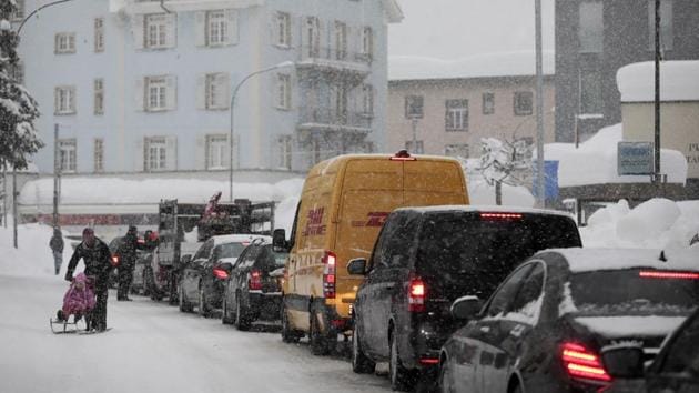 The droves of black limousines on the snow-covered streets of Davos during the World Economic Forum are frustrating the locals of the Swiss mountain town.(Bloomberg Photo) The droves of black limousines on the snow-covered streets of Davos during the World Economic Forum are frustrating the locals of the Swiss mountain town.(Bloomberg Photo)