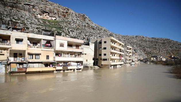 This year, days of torrential rain in the mountains of Lebanon have sent a deluge downstream, submerging Darkush under as much as a metre and a half (five feet) of water. So instead the father of four is working long hours each day paddling his boat around the streets helping stricken residents to get their children to school, do the shopping or check on relatives. (Aaref Watad / AFP)