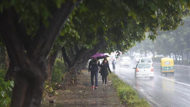 Hail storms were reported in areas like Subhash Nagar and Paschim Vihar in the morning in the city, which received rains throughout on Monday night. Some trees were also uprooted after the rains. News agency ANI reported that at least 15 trains to the Capital were delayed due to fog and low visibility. (Amal KS / HT Photo) Hail storms were reported in areas like Subhash Nagar and Paschim Vihar in the morning in the city, which received rains throughout on Monday night. Some trees were also uprooted after the rains. News agency ANI reported that at least 15 trains to the Capital were delayed due to fog and low visibility. (Amal KS / HT Photo)