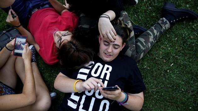 Gabriel Diaz de Tudanca, 17, hangs out with some trans friends at a park in Madrid, Spain on August 3, 2016. “My friends, both cisgender (people whose gender identity matches the sex they were assigned at birth) and trans are really important to me. They helped me overcome my fears of coming out to my parents,” Diaz de Tudanca said. (Susana Vera / REUTERS) Gabriel Diaz de Tudanca, 17, hangs out with some trans friends at a park in Madrid, Spain on August 3, 2016. “My friends, both cisgender (people whose gender identity matches the sex they were assigned at birth) and trans are really important to me. They helped me overcome my fears of coming out to my parents,” Diaz de Tudanca said. (Susana Vera / REUTERS)