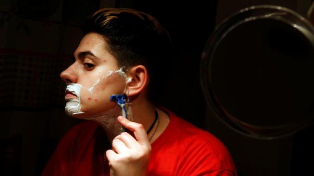 Gabriel Diaz de Tudanca shaves his face two months after he started taking testosterone on February 15, 2016. "I took hormone blockers for three months and was soon started on testosterone. My period stopped right away and that made me very happy, I really disliked it," Diaz de Tudanca said. (Susana Vera / REUTERS) Gabriel Diaz de Tudanca shaves his face two months after he started taking testosterone on February 15, 2016. "I took hormone blockers for three months and was soon started on testosterone. My period stopped right away and that made me very happy, I really disliked it," Diaz de Tudanca said. (Susana Vera / REUTERS)