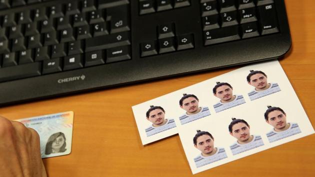 Current pictures of transgender teenager Gabriel Diaz de Tudanca, 18, lie next to his former identity card as he waits to be issued with a new identity card on January 26, 2017. “I didn’t take it that badly, being diagnosed as ‘mentally ill’,” he said. “But I feel angry that you have to get that diagnosis to be able to change documents, get hormone treatment or surgery.” (Susana Vera / REUTERS) Current pictures of transgender teenager Gabriel Diaz de Tudanca, 18, lie next to his former identity card as he waits to be issued with a new identity card on January 26, 2017. “I didn’t take it that badly, being diagnosed as ‘mentally ill’,” he said. “But I feel angry that you have to get that diagnosis to be able to change documents, get hormone treatment or surgery.” (Susana Vera / REUTERS)