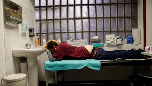 Gabriel aged 16, lays down for his first testosterone shot in Madrid on December 16, 2015. “I was very excited to get started on the testosterone. I was eager for all the changes that were going to come with it…But I didn’t want to make much of a mental picture of the way I could look so as not to feel disappointed afterwards,” Diaz de Tudanca said. (Susana Vera / REUTERS) Gabriel aged 16, lays down for his first testosterone shot in Madrid on December 16, 2015. “I was very excited to get started on the testosterone. I was eager for all the changes that were going to come with it…But I didn’t want to make much of a mental picture of the way I could look so as not to feel disappointed afterwards,” Diaz de Tudanca said. (Susana Vera / REUTERS)