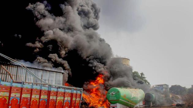 Smoke billows out of a tyre godown where a major fire broke out at Nevada village at Taloja in Navi Mumbai. (PTI) Smoke billows out of a tyre godown where a major fire broke out at Nevada village at Taloja in Navi Mumbai. (PTI)