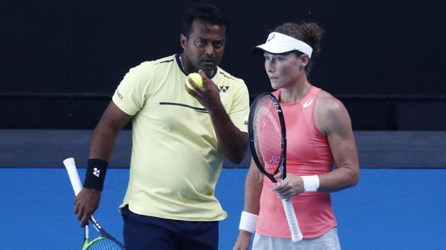 Australia's Samantha Stosur and India's Leander Paes talk during an Australian Open match.(Reuters)
