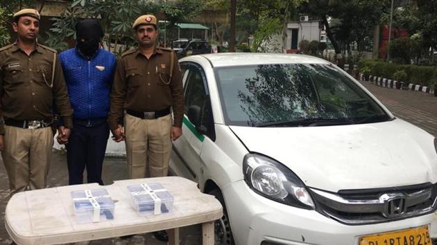 Sagar Kumar (face covered), one of the two attackers, was arrested by police. (HT Photo) Sagar Kumar (face covered), one of the two attackers, was arrested by police. (HT Photo)