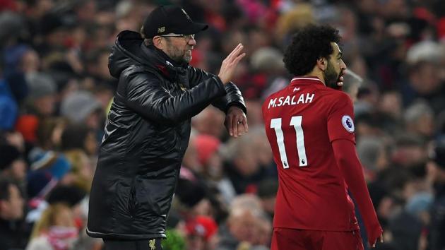 Liverpool's German manager Jurgen Klopp (L) speaks with Liverpool's Egyptian midfielder Mohamed Salah during the English Premier League football match between Liverpool and Crystal Palace at Anfield in Liverpool (AFP) Liverpool's German manager Jurgen Klopp (L) speaks with Liverpool's Egyptian midfielder Mohamed Salah during the English Premier League football match between Liverpool and Crystal Palace at Anfield in Liverpool (AFP)