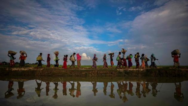 The BSF Tuesday handed over the 31 Rohingya Muslims, who were stranded on the India-Bangladesh border for four days, to Tripura Police, even as 30 more community members were apprehended in Assam, officials said.(Reuters)