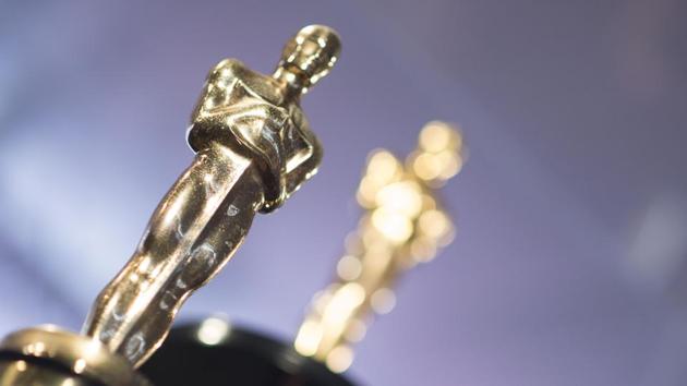 In this file photo taken on March 1, 2018 Oscars statuettes stand on display during a preview for the Governors Ball during the 90th annual Academy Awards week in Hollywood, California.(AFP)