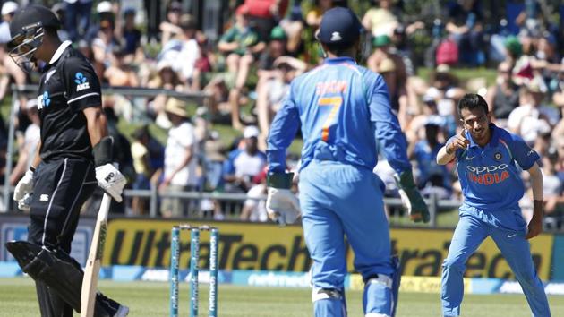India's Yuzvendradra Chahal, right, celebrates dismissing New Zealand's Ross Taylor. (AP) India's Yuzvendradra Chahal, right, celebrates dismissing New Zealand's Ross Taylor. (AP)