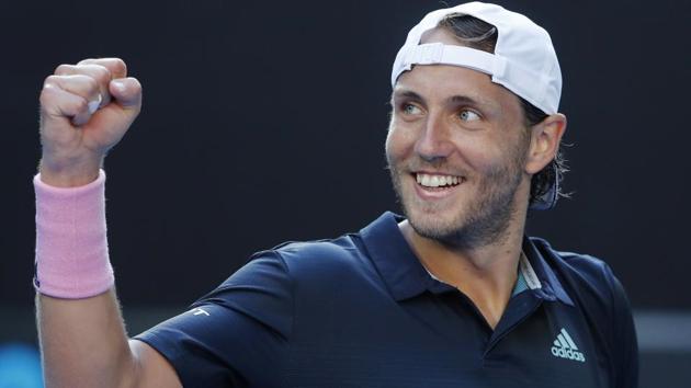 France's Lucas Pouille celebrates after winning the match against Canada's Milos Raonic.(REUTERS)