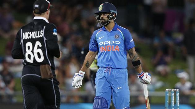 India's Virat Kohli, right, shows emotion after being dismissed. (AP) India's Virat Kohli, right, shows emotion after being dismissed. (AP)