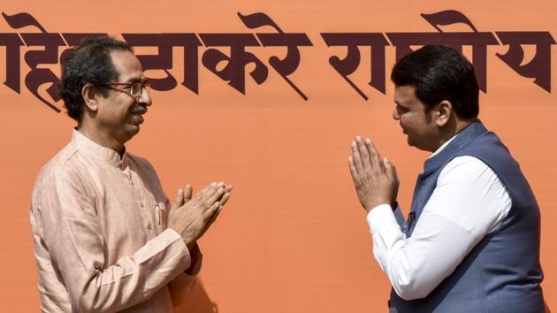 Maharashtra CM Devendra Fadnavis (right) greets Shiv Sena Chief Uddhav Thackeray at an event in Dadar, on Wednesday. (Kunal Patil/HT Photo) Maharashtra CM Devendra Fadnavis (right) greets Shiv Sena Chief Uddhav Thackeray at an event in Dadar, on Wednesday. (Kunal Patil/HT Photo)