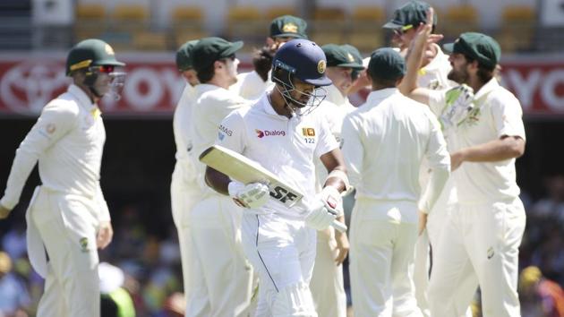 Sri Lanka's Dinesh Chandimal, center, walks off the field after he lost his wicket. (AP) Sri Lanka's Dinesh Chandimal, center, walks off the field after he lost his wicket. (AP)