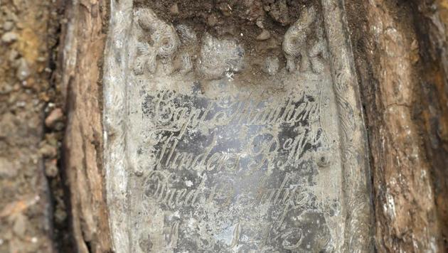 Image showing the lead plate placed on top of the coffin of Captain Matthew Flinders at the archaeological excavation and research works at St James's Gardens in Euston, London. (AP Photo) Image showing the lead plate placed on top of the coffin of Captain Matthew Flinders at the archaeological excavation and research works at St James's Gardens in Euston, London. (AP Photo)