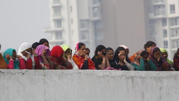 People from neighbouring building look as a 4-storyed-building collapsed in Ullahawas village, near Gurugram, on early Thursday morning. (Yogendra Kumar/HT Photo) People from neighbouring building look as a 4-storyed-building collapsed in Ullahawas village, near Gurugram, on early Thursday morning. (Yogendra Kumar/HT Photo)
