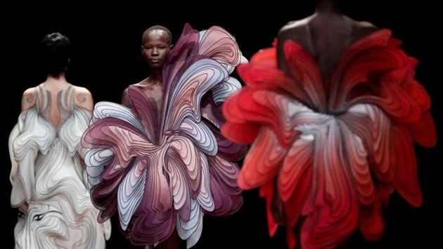 Models present creations by Dutch designer Iris van Herpen as part of her Haute Couture Spring-Summer 2019 collection show in Paris, France. (Benoit Tessier / REUTERS) Models present creations by Dutch designer Iris van Herpen as part of her Haute Couture Spring-Summer 2019 collection show in Paris, France. (Benoit Tessier / REUTERS)