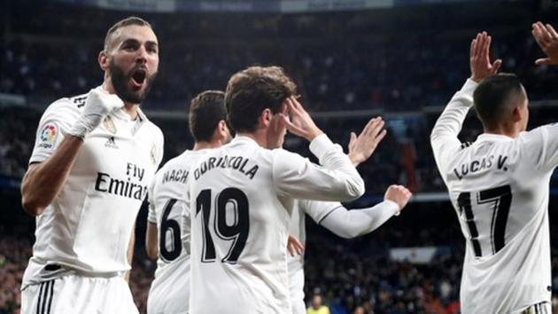 Real Madrid's Karim Benzema celebrates scoring their fourth goal(REUTERS)