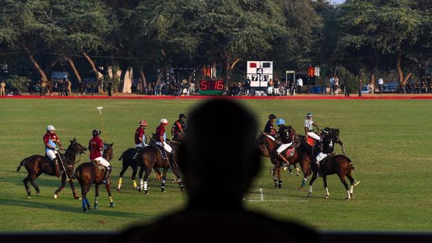 President Ram Nath Kovind watches a friendly polo match by members of the President's Bodyguard at the presidential parade ground. Unlike other Indian cavalry units, the horses’ manes are allowed to grow and are shampooed and sometimes braided for special occasions. In their downtime, the regiment love their polo and the connection between man and steed is strong. (Chandan Khanna / AFP) President Ram Nath Kovind watches a friendly polo match by members of the President's Bodyguard at the presidential parade ground. Unlike other Indian cavalry units, the horses’ manes are allowed to grow and are shampooed and sometimes braided for special occasions. In their downtime, the regiment love their polo and the connection between man and steed is strong. (Chandan Khanna / AFP)