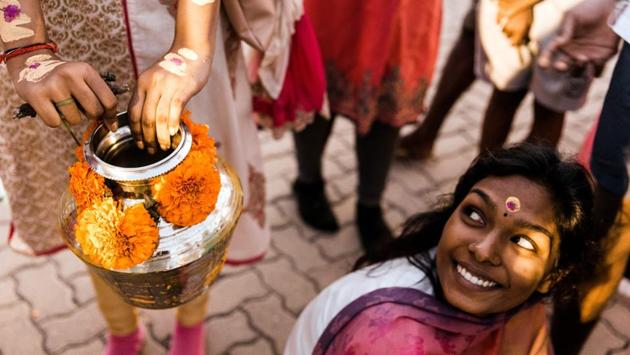 A Hindu devotee smiles she takes part in the annual Hindu Thaipoosam Kavady festival held at Shree Emperumal Hindu Temple in Mount Edgecombe township, some 42 kms north of Durban in South Africa. (Rajesh Jantial / AFP) A Hindu devotee smiles she takes part in the annual Hindu Thaipoosam Kavady festival held at Shree Emperumal Hindu Temple in Mount Edgecombe township, some 42 kms north of Durban in South Africa. (Rajesh Jantial / AFP)