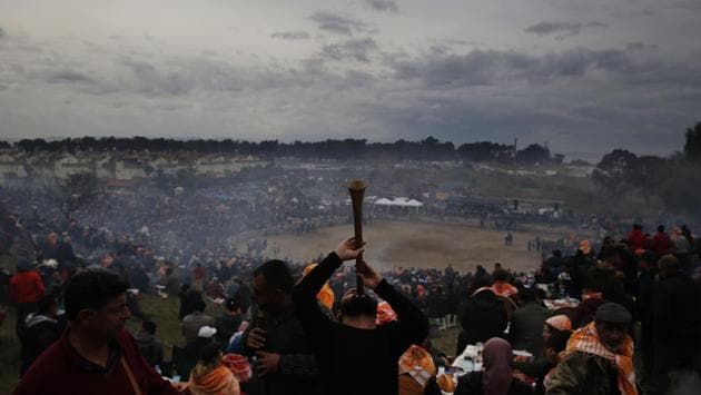 A musician performs traditional folk songs, as spectators enjoy on the hill overlooking the arena. The fights, for which there are no prizes, last a few minutes. They end after one camel manages to topple the other, or forces them to run away. Many of the duels end in a tie, with neither camel able to make the other submit. (Lefteris Pitarakis / AP) A musician performs traditional folk songs, as spectators enjoy on the hill overlooking the arena. The fights, for which there are no prizes, last a few minutes. They end after one camel manages to topple the other, or forces them to run away. Many of the duels end in a tie, with neither camel able to make the other submit. (Lefteris Pitarakis / AP)