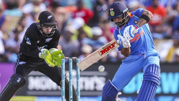 Virat Kohli, right, of India plays during the second one day international between India and New Zealand.(AP)