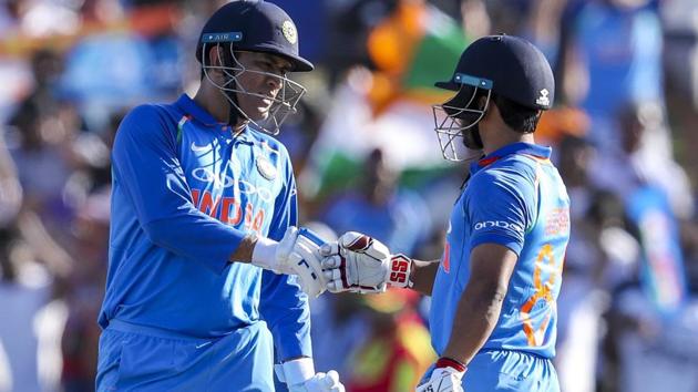 MS Dhoni and Kedar Jadhav of India react during the second one day international between India and New Zealand. (AP) MS Dhoni and Kedar Jadhav of India react during the second one day international between India and New Zealand. (AP)