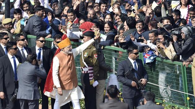 As the parade ended, Prime Minister Narendra Modi greeted the huge crowd gathered at Rajpath for Republic Day celebrations. (Ajay Aggarwal / HT Photo) 