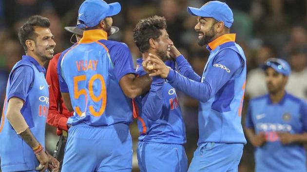 Kuldeep Yadav , center, of India celebrates during the second one day international between India and New Zealand. (AP)