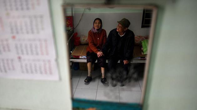 He could not imagine he would find new life at the leprosy hospice where he has been living for 61 years, a walled off compound in northern Thai Binh province where he met his wife Nyugen Thi Teo, worked as a union boss and took in needy children. (Manan Vatsyayana / AFP) He could not imagine he would find new life at the leprosy hospice where he has been living for 61 years, a walled off compound in northern Thai Binh province where he met his wife Nyugen Thi Teo, worked as a union boss and took in needy children. (Manan Vatsyayana / AFP)