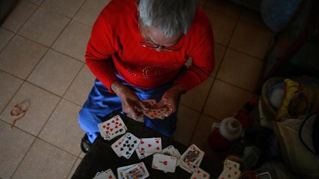 A leprosy survivor sorts stacks of playing cards alone in his room. Founded in 1900, Van Mon is the oldest leprosy hospital in northern Vietnam. At its peak it treated 4,000 patients a year -- a number that has dwindled as leprosy cases have dropped thanks to improved healthcare, hygiene and greater awareness of the disease. (Manan Vatsyayana / AFP) A leprosy survivor sorts stacks of playing cards alone in his room. Founded in 1900, Van Mon is the oldest leprosy hospital in northern Vietnam. At its peak it treated 4,000 patients a year -- a number that has dwindled as leprosy cases have dropped thanks to improved healthcare, hygiene and greater awareness of the disease. (Manan Vatsyayana / AFP)