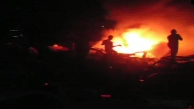 Fire breaks out in a parked cab in Malaji Pada, Vasai.(ANI photo) Fire breaks out in a parked cab in Malaji Pada, Vasai.(ANI photo)