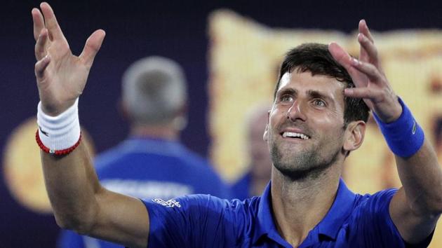 Serbia's Novak Djokovic celebrates after defeating Spain's Rafael Nadal.(AP)