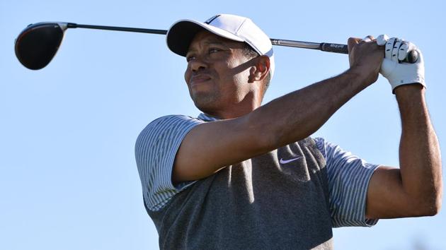 Tiger Woods plays his shot from the 12th tee during the third round of the Farmers Insurance Open golf tournament at Torrey Pines Municipal Golf Course . (USA TODAY Sports) Tiger Woods plays his shot from the 12th tee during the third round of the Farmers Insurance Open golf tournament at Torrey Pines Municipal Golf Course . (USA TODAY Sports)