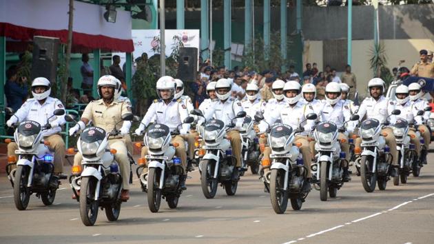 Police personnel parade on motorcycles during the Republic Day parade at Shivajinagar Police ground  (HT PHOTO) 