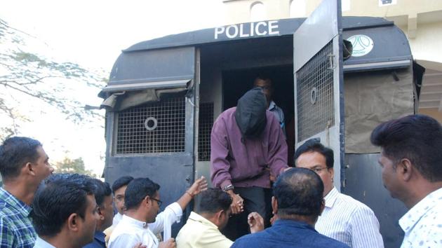 One of the nine suspects held for alleged links with terror outfit ISIS being produced in a court at Aurangabad by Maharashtra ATS. (HT Photo) One of the nine suspects held for alleged links with terror outfit ISIS being produced in a court at Aurangabad by Maharashtra ATS. (HT Photo)