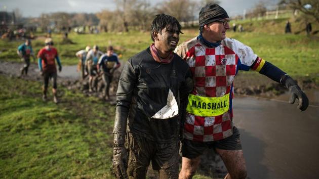 Safety marshals are on hand to help out, and contenders do not have to complete every part. “We advise them, don’t do it if you don’t fancy it. Come back next year.” He stopped the event in 2017 due to his own health problems, but is pleased to see it back again. (Oli Scarff / AFP) Safety marshals are on hand to help out, and contenders do not have to complete every part. “We advise them, don’t do it if you don’t fancy it. Come back next year.” He stopped the event in 2017 due to his own health problems, but is pleased to see it back again. (Oli Scarff / AFP)
