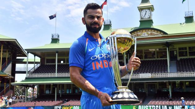 File photo of Virat Kohli with the cricket World Cup trophy.(AFP)