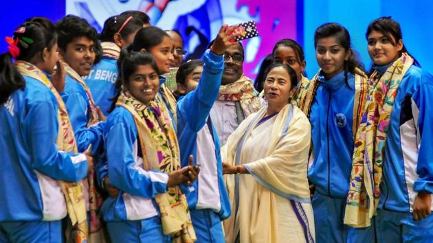 The Women Junior Volleyball National Champion team clicks a selfie with West Bengal Chief Minister Mamata Banerjee after they were given a special award during Khelashree award ceremony, in Kolkata. (PTI) The Women Junior Volleyball National Champion team clicks a selfie with West Bengal Chief Minister Mamata Banerjee after they were given a special award during Khelashree award ceremony, in Kolkata. (PTI)