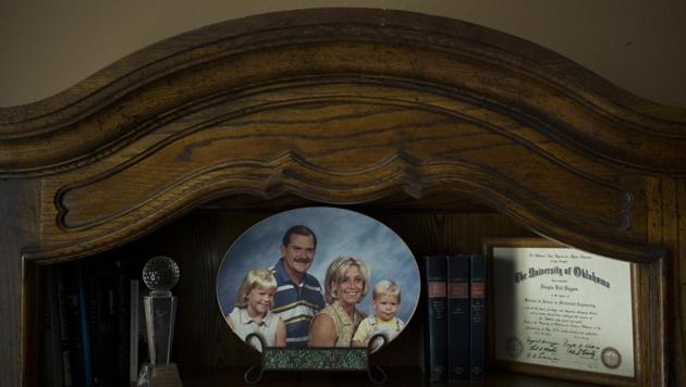 Landon Biggers sits on his mother’s lap in an old family photo in his father’s home office in La Quinta, California. Biggers became one of 70,237 Americans dead from opioids overdose in 2017. The death count from opioids alone has climbed higher than 400,000 lives as the epidemic enters its third decade. For families like this one, the scars of the crisis will endure far longer. (Jae C. Hong / AP) Landon Biggers sits on his mother’s lap in an old family photo in his father’s home office in La Quinta, California. Biggers became one of 70,237 Americans dead from opioids overdose in 2017. The death count from opioids alone has climbed higher than 400,000 lives as the epidemic enters its third decade. For families like this one, the scars of the crisis will endure far longer. (Jae C. Hong / AP)