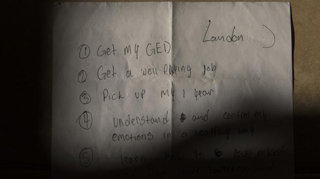 A to-do list written on a piece of paper by Landon Biggers is lit by the sunlight seen at his parents’ home. Most of what they have left of Landon is like this, fraught with lost hope of what might have been: a handful of sobriety tokens but few that make it past 30 days, an empty wallet, a handwritten list of goals he never accomplished, the dog that was supposed to save his life but didn’t. (Jae C. Hong / AP) A to-do list written on a piece of paper by Landon Biggers is lit by the sunlight seen at his parents’ home. Most of what they have left of Landon is like this, fraught with lost hope of what might have been: a handful of sobriety tokens but few that make it past 30 days, an empty wallet, a handwritten list of goals he never accomplished, the dog that was supposed to save his life but didn’t. (Jae C. Hong / AP)