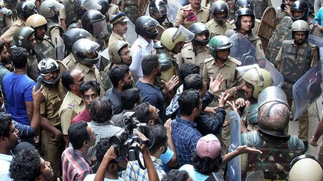 Shop owners stage a protest demanding protection during the statewide hartal called by pro-Hindutva outfits against the entry of two women into the Lord Ayyappa Temple (Sabarimala), in Kozhikode.(PTI FILE PHOTO)